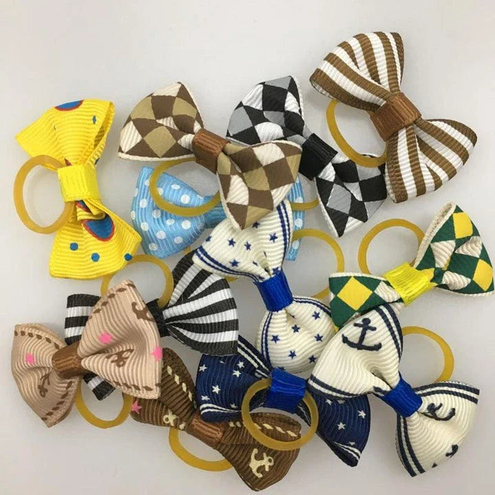 Colourful pet hair bows in assorted colours, made with premium ribbon and rubber for a secure and comfortable fit.