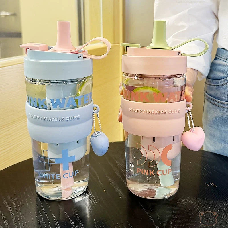 27oz water bottle with straw filter cover in pink, green, and blue colours for stylish hydration on the go