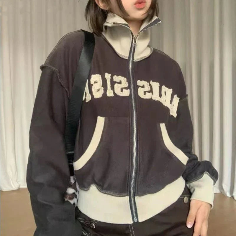 A premium retro-inspired women's sweater jacket made of high-quality polyester with a loose, comfortable fit and a timeless design.