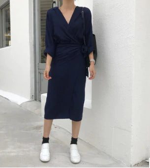 Irregular wrap dress in beige with a unique, contemporary design and premium cotton blend fabric