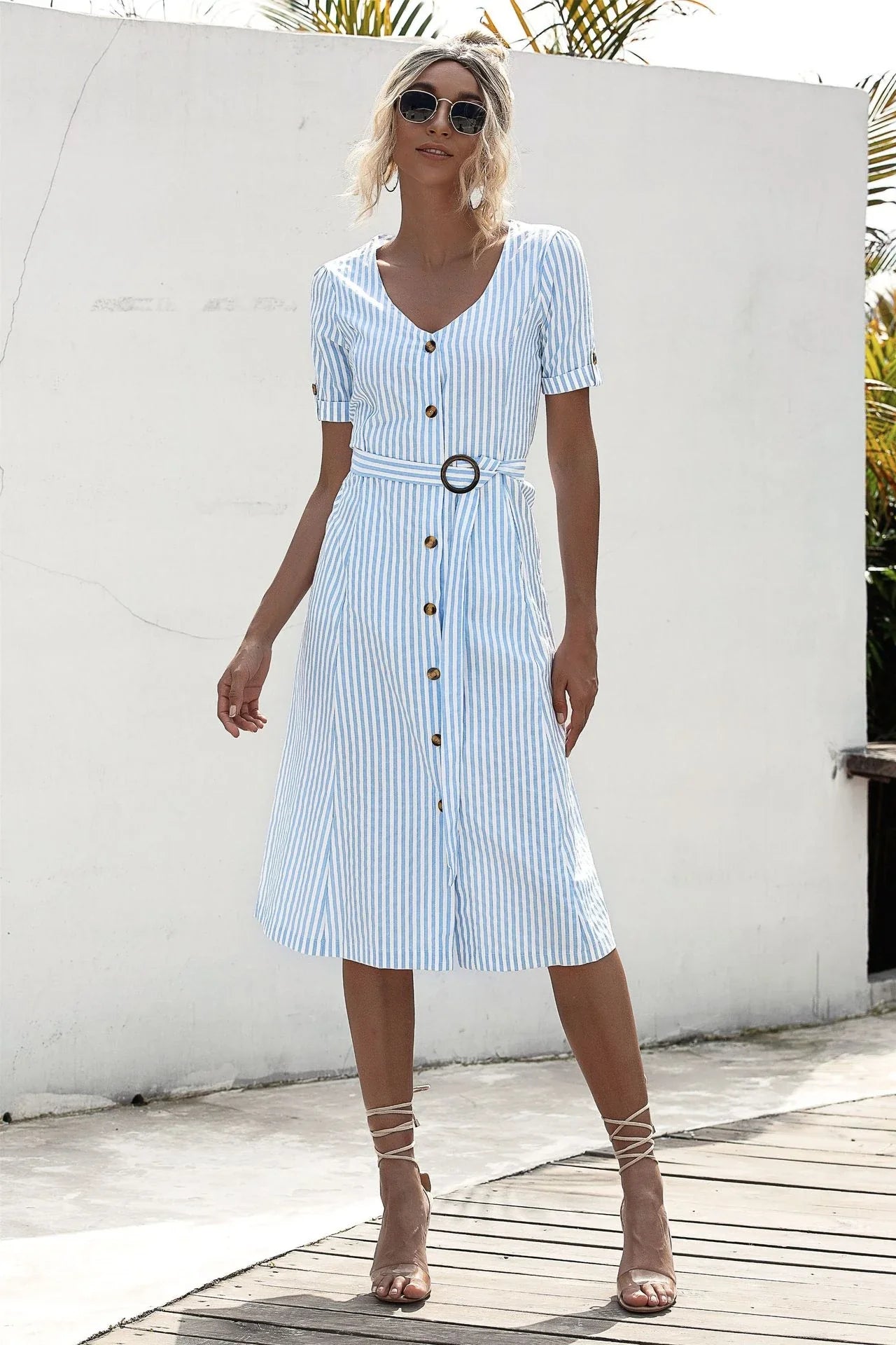 Stylish lace-up button dress in a soft, breathable cotton-blend fabric with a flattering middle waist silhouette