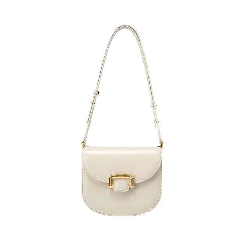 Premium high-end British wedding shoulder bag in brown, with a unique saddle shape design and hardwearing leather exterior