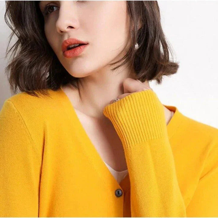 Chic v-neck single breasted cardigan in blue, green, and pink colours with a sophisticated and timeless design