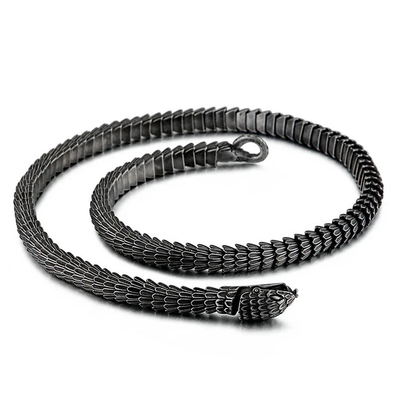 Elegant stainless steel snake bracelet in a sleek, polished black finish for men