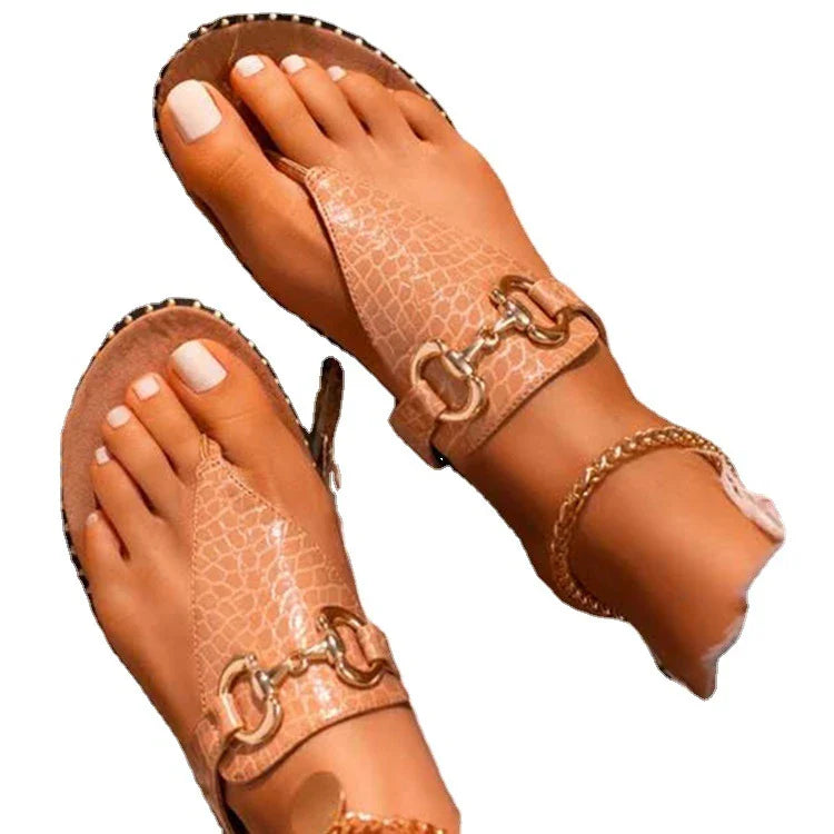 Stylish and comfortable women's leather sandals with a sleek metal buckle, perfect for summer