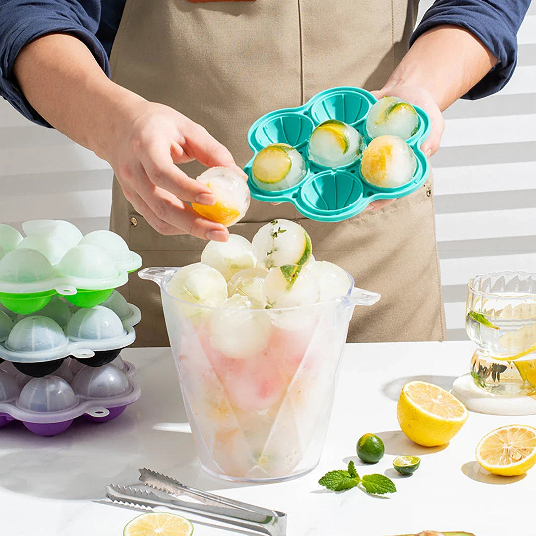 Spherical silicone ice mould with seven holes for creating perfectly round ice spheres to chill drinks