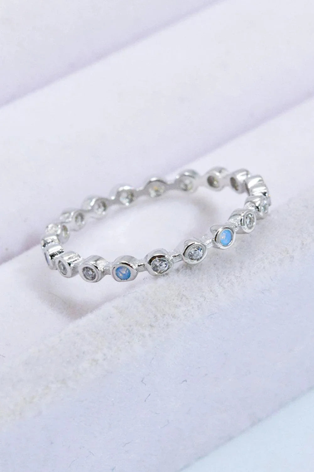 Elegant 925 sterling silver ring with natural moonstone centrepiece and zircon accents