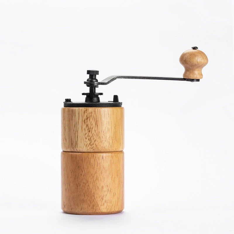 Elegant wooden manual coffee grinder with premium steel conical burr for consistent, flawless grinding