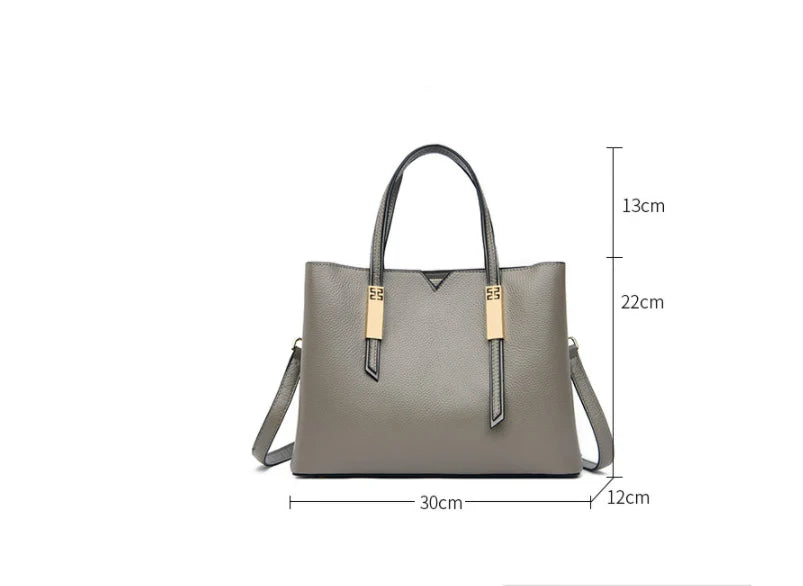 Premium cowhide crossbody handbag in black, grey, red, and yellow colours with adjustable strap and spacious compartments
