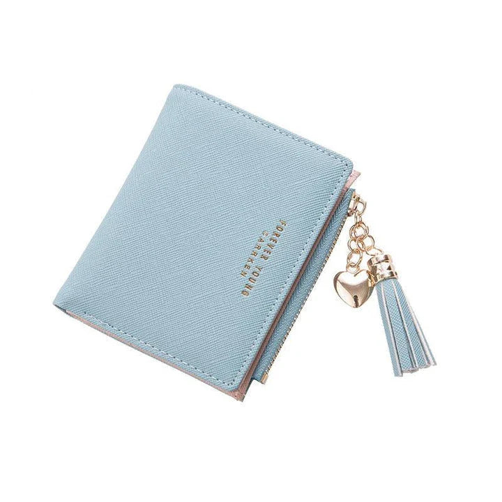 Premium genuine leather women's coin purse with zipper closure, available in black, brown, and navy colours, and multiple sizes.