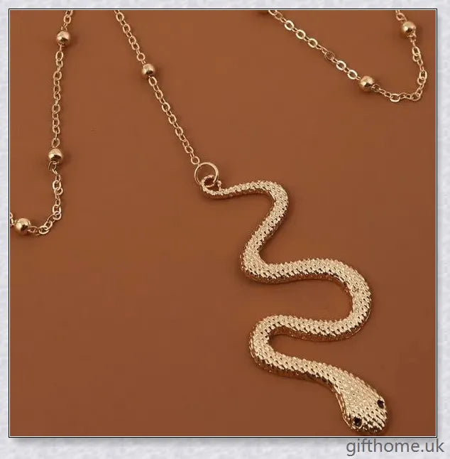 Premium gold metal Bohemian-style thigh chain with intricate beading and an adjustable fit