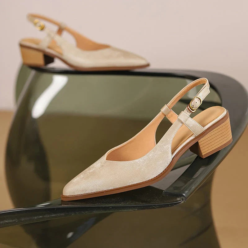 Elegant slingback leather pumps with a stylish mule design, secure buckle closure, and 4cm square heel