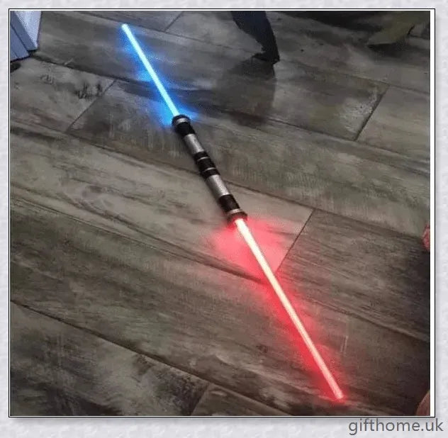 Premium dual-bladed lightsaber with sleek silver hilt, vibrant light modes, and sound effects for authentic Star Wars gameplay