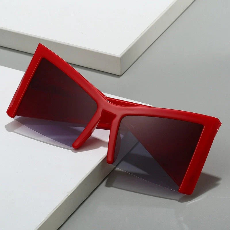 Irregular semi-rimless sunglasses with UV400 protection, offering a unique and stylish design for both men and women