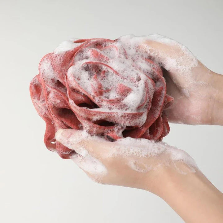 Luxurious flower-shaped shower puffs in vibrant colours for a rejuvenating spa-like cleansing experience