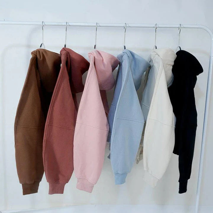 Premium women's sports fleece hoodie with half zip, available in a range of sophisticated colours