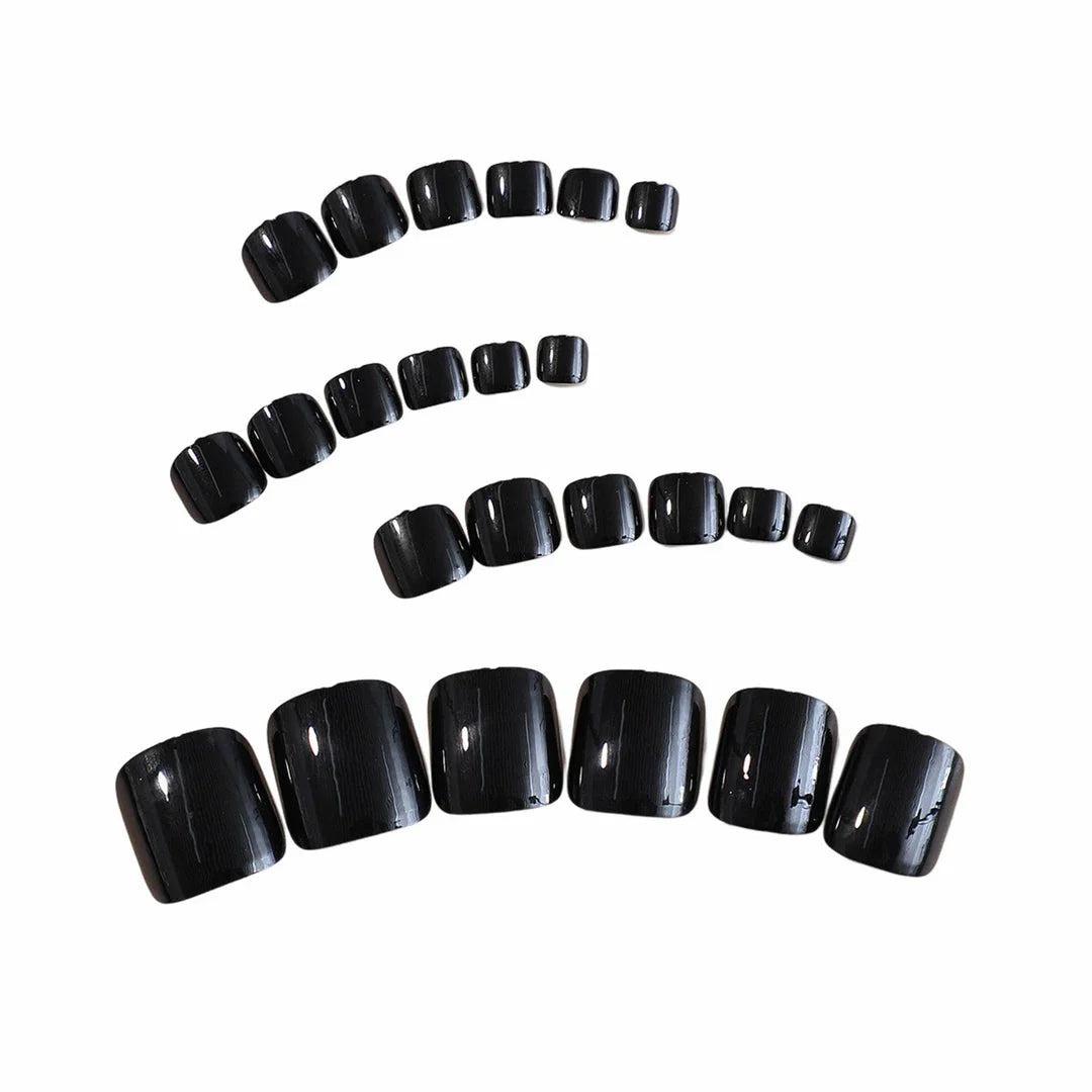 Set of 24 black glossy false toenails for a salon-quality pedicure