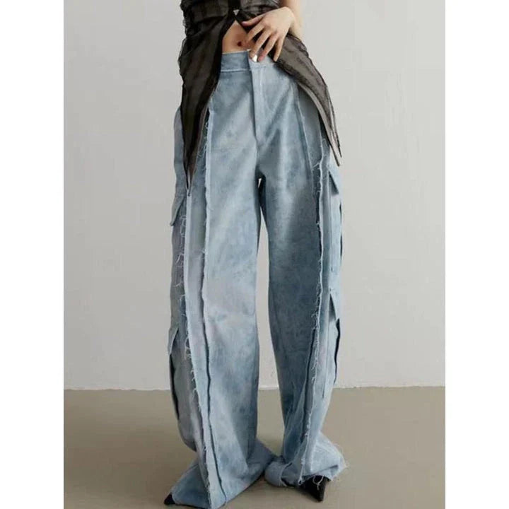 High-waisted tie-dye denim trousers with a straight-leg silhouette and practical pockets