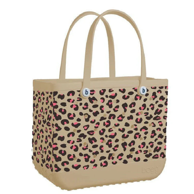 Premium waterproof beach tote bag in various vibrant colours, featuring spacious main compartment and multiple pockets for organised storage