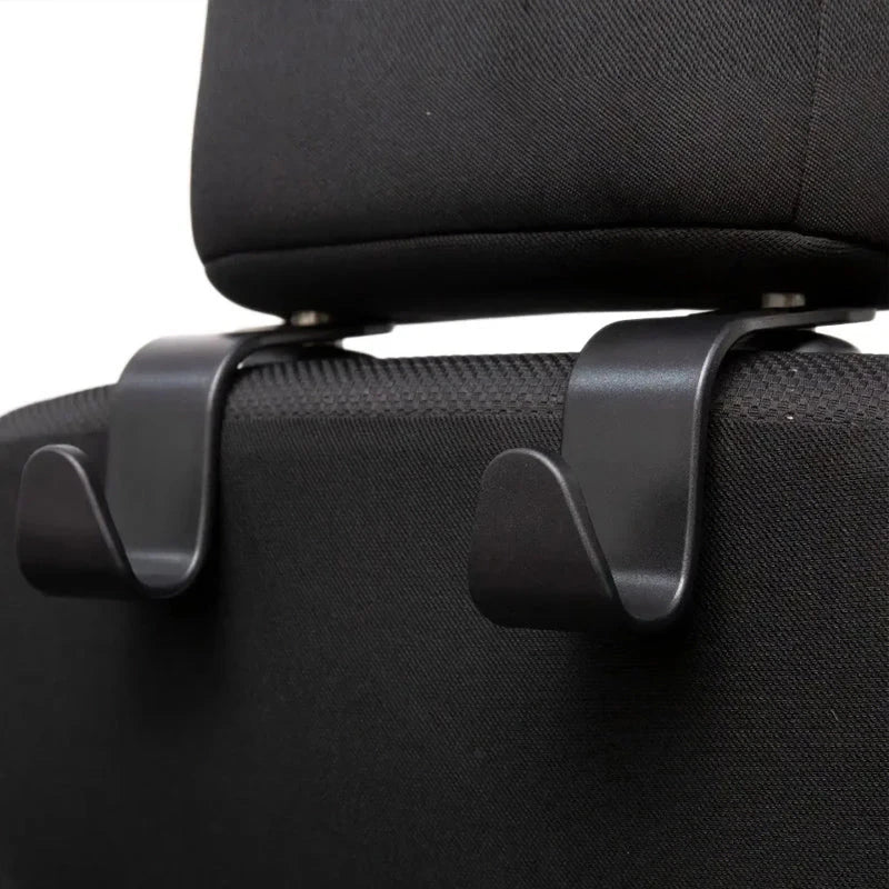 Premium 4-pack car seat headrest hooks in black, designed to organise and declutter UK drivers' vehicles
