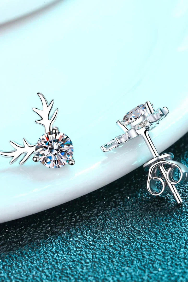 Elegant sterling silver ring featuring a reindeer-shaped moissanite centre stone with a polished finish