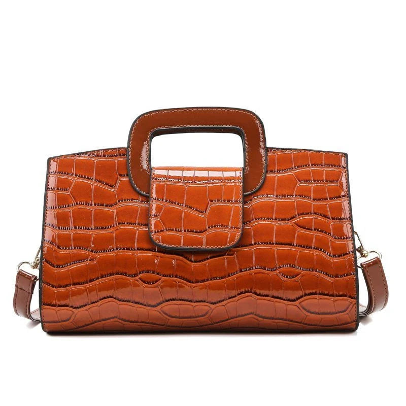 A stylish and versatile retro-patterned handbag with a sturdy canvas construction and organised interior, perfect for everyday use in the UK.