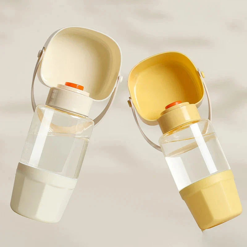 Portable pet water bottle and feeder with separate compartments for water and food, designed for easy hydration and feeding during outdoor adventures.