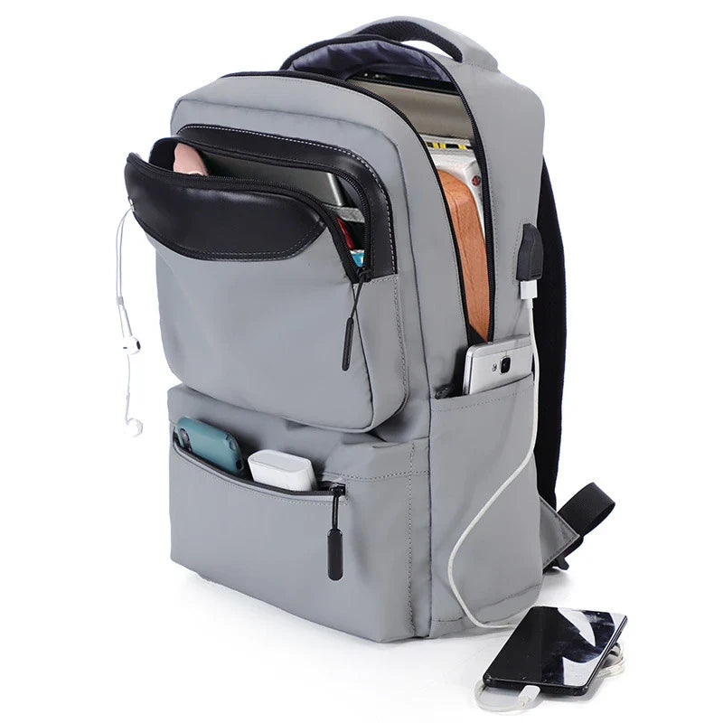 Premium waterproof outdoor backpack for men with laptop compartment, multiple pockets, and breathable design