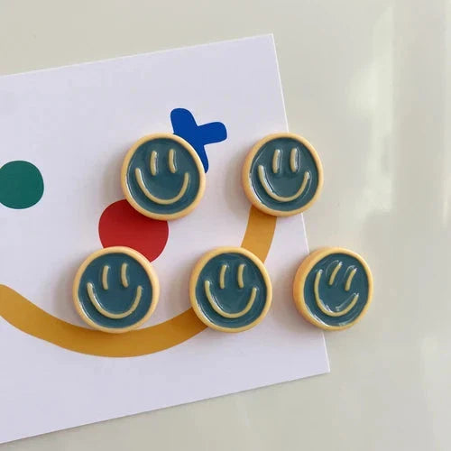 Cheerful Nordic-inspired refrigerator magnets with cartoon designs in various colours, made of high-quality resin for durability