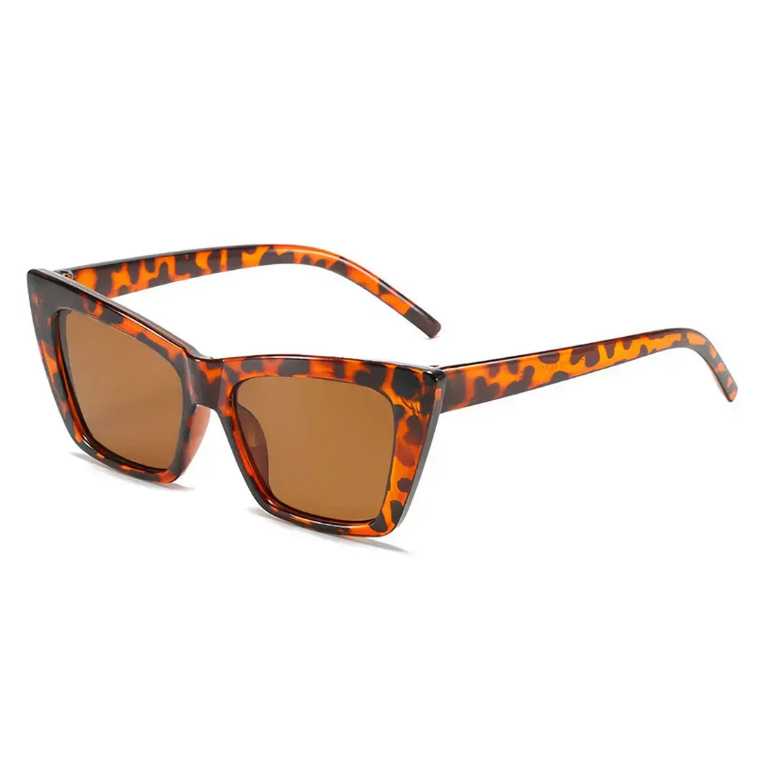 Trendy cat-eye sunglasses with polycarbonate lenses that provide UV400 protection and anti-reflective coating for enhanced clarity