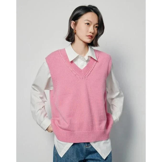Elegant sleeveless v-neck knit vest in rose red and black colours, with a stylish split back design for a flattering silhouette