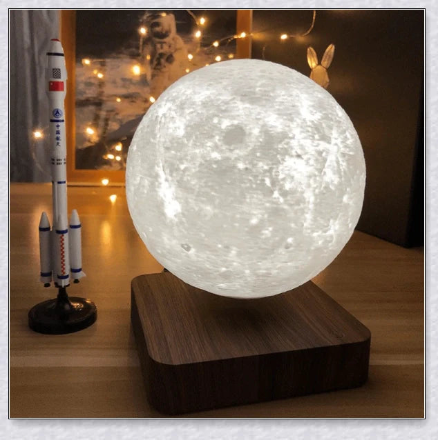 Lunamen Magnetic Levitating Moon Lamp with detailed lunar surface and floating above magnetic base