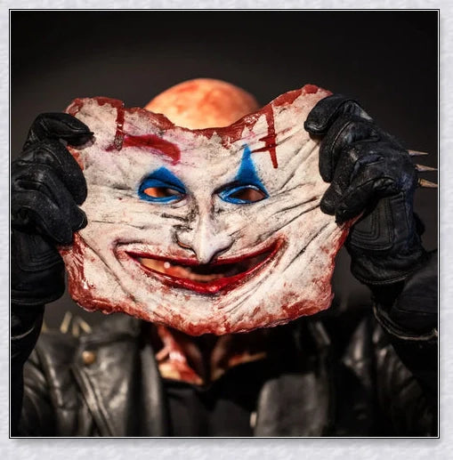 Terrifyingly lifelike horror mask with two removable layers, articulated jaw, and breathable design for a comfortable Halloween costume