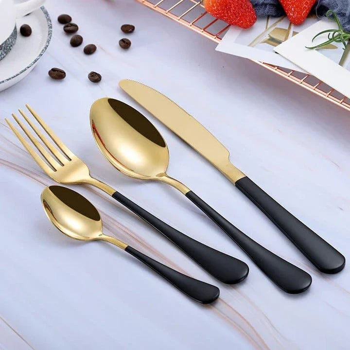 Premium eco-friendly stainless steel tableware set including knife, fork, spoon, and tea spoon in a sophisticated frosted finish