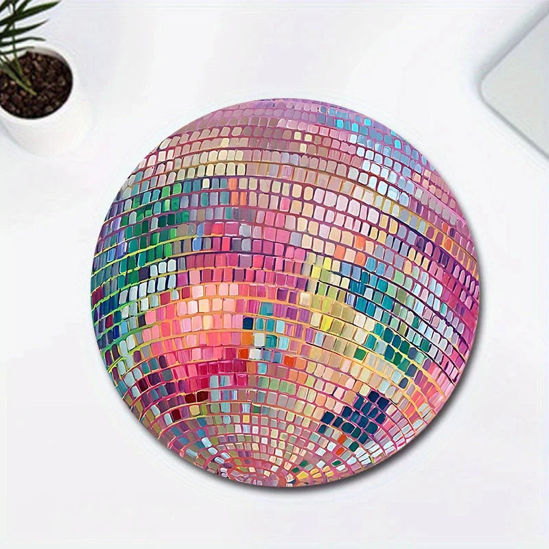 Vibrant pink disco ball pattern mouse pad for a stylish and functional desk accessory