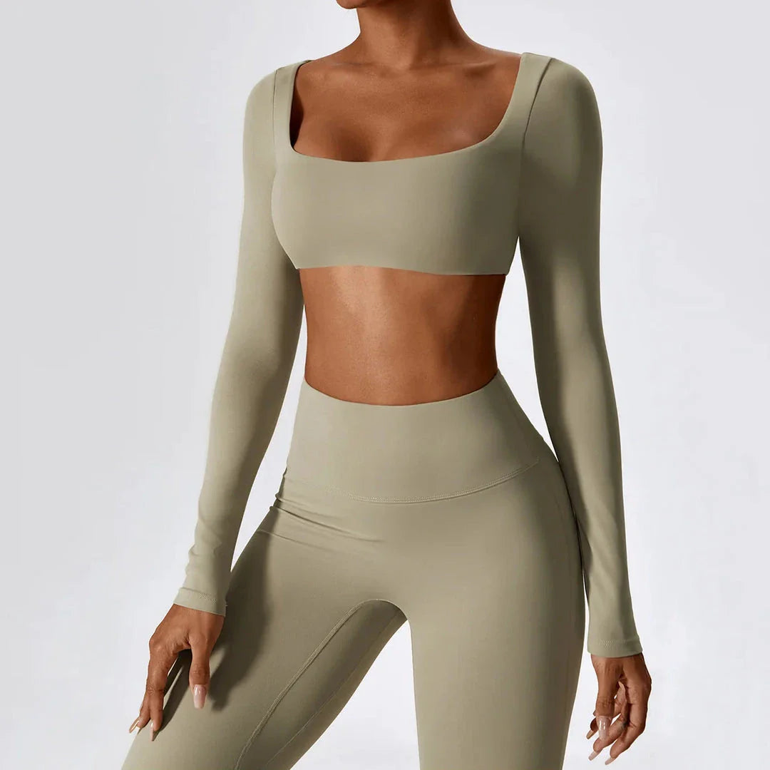 Stylish long sleeve crop top yoga shirt in green, designed for comfort and performance during workouts