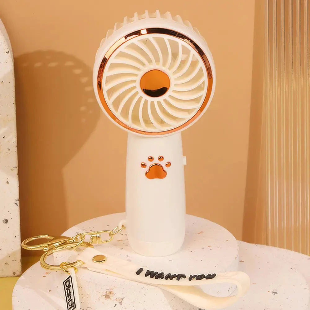 Compact, cartoon-themed USB handheld fan for keeping cool during the summer months