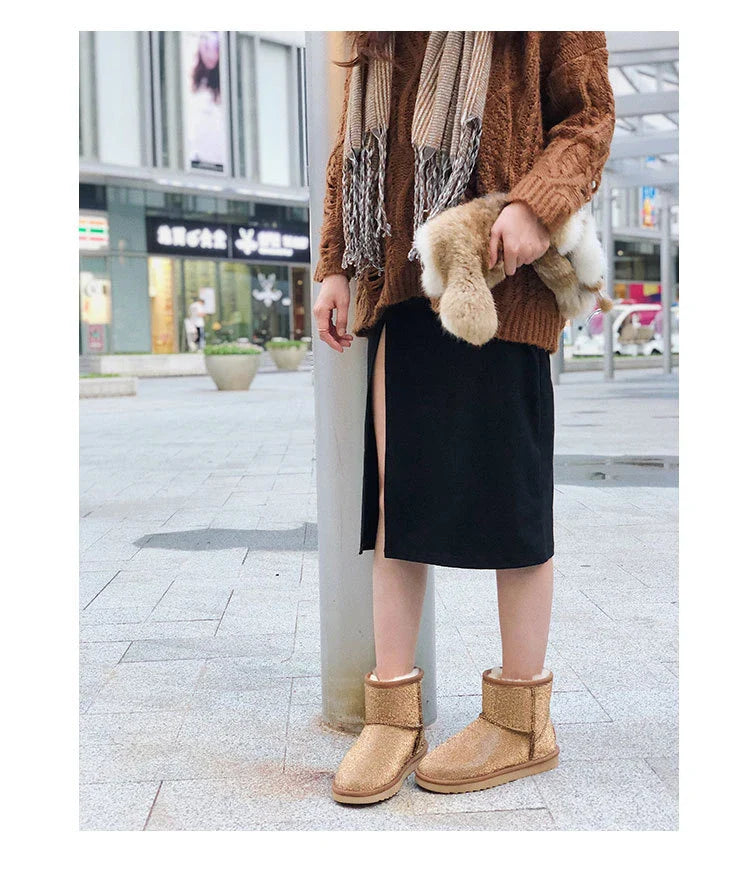 Premium rhinestone-embellished ankle boots for women, featuring a shimmering upper and durable rubber sole for winter wear