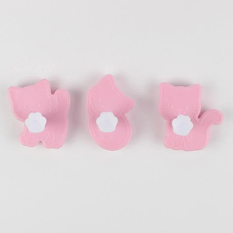 Kitten-shaped cookie moulds in pink colour, a charming baking set for creating adorable homemade treats