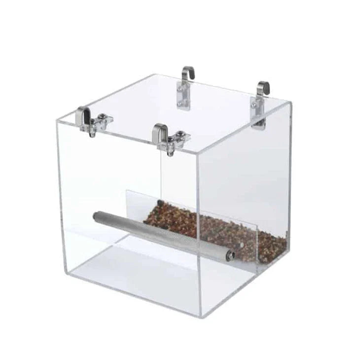 A transparent acrylic bird feeder cube with a sleek and modern design, perfect for adding a touch of elegance to your garden or balcony.