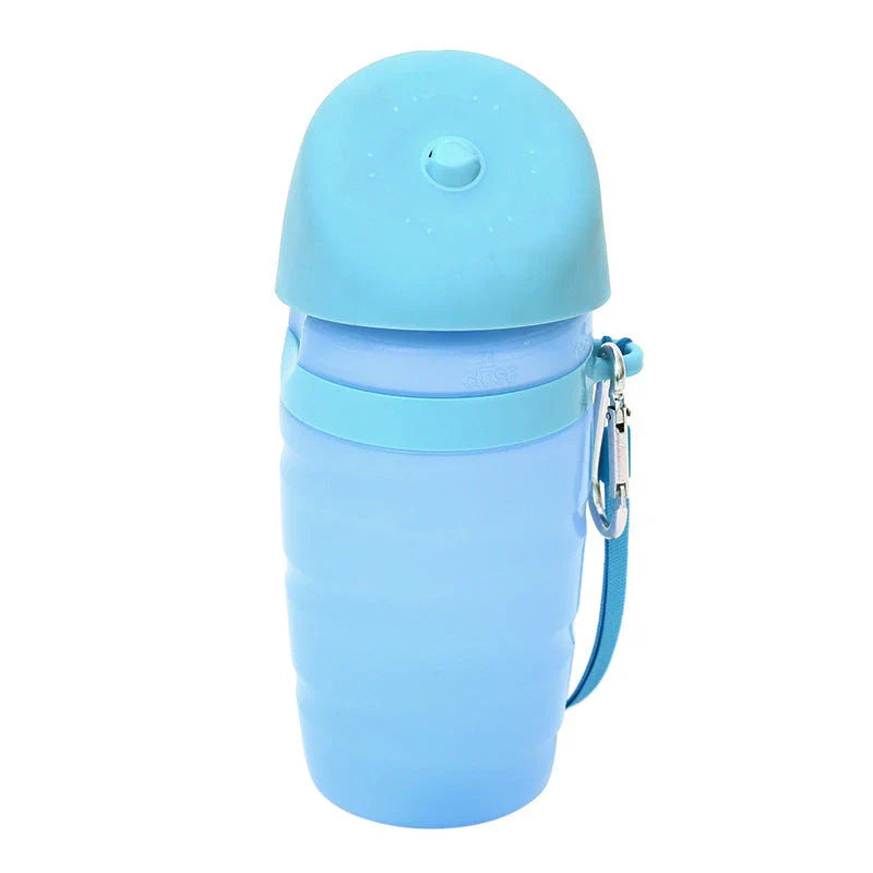 Portable dog water bottle with foldable drinking cup bowl, made of durable and food-grade plastic for safe hydration on walks, hikes, and outdoor activities.