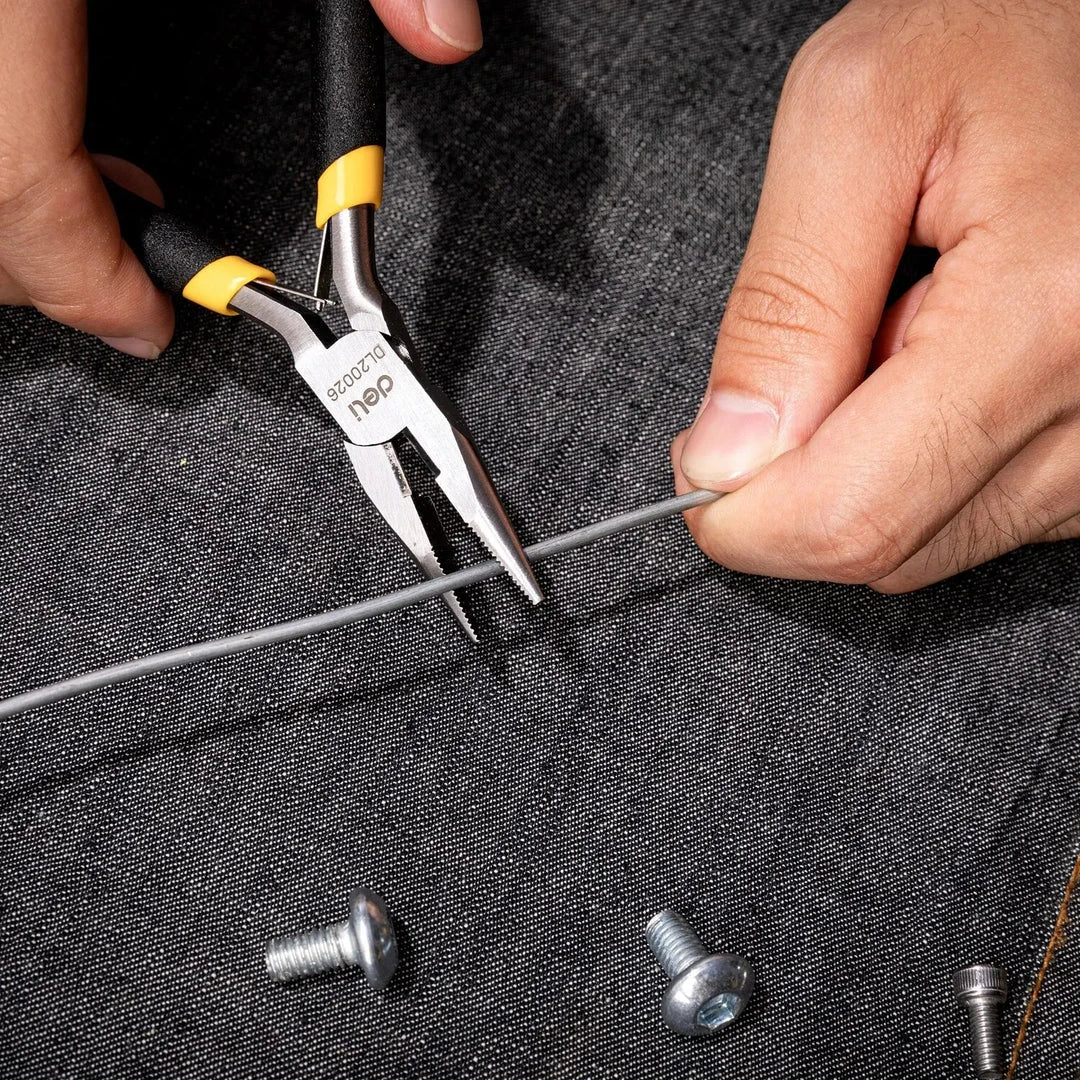 A close-up view of a pair of 5-inch mini long nose pliers with a carbon steel construction and a comfortable plastic handle.