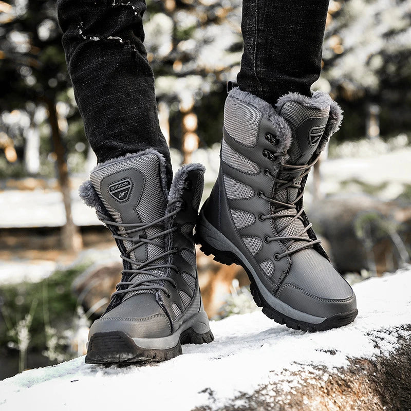 Rugged and insulated winter boots designed for the adventurous British man, featuring a durable, water-resistant outer shell and a flexible, supportive design.
