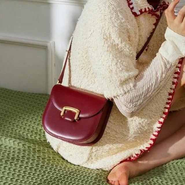 Premium high-end British wedding shoulder bag in brown, with a unique saddle shape design and hardwearing leather exterior