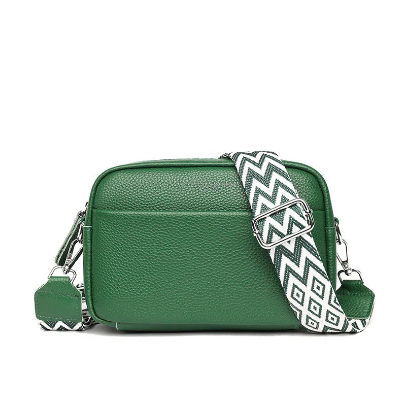 Stylish leather crossbody bag with embroidered strap in various colours