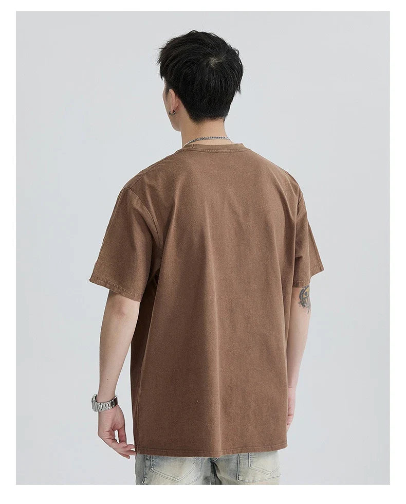 Premium vintage-inspired short-sleeved t-shirt in a distressed black colour, made of soft pure cotton fabric