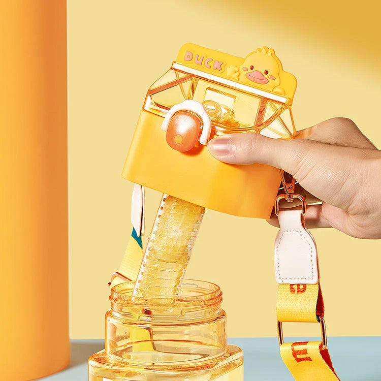 Charming cartoon-themed reusable plastic cup with straw and tea infuser, perfect for daily hydration and on-the-go use