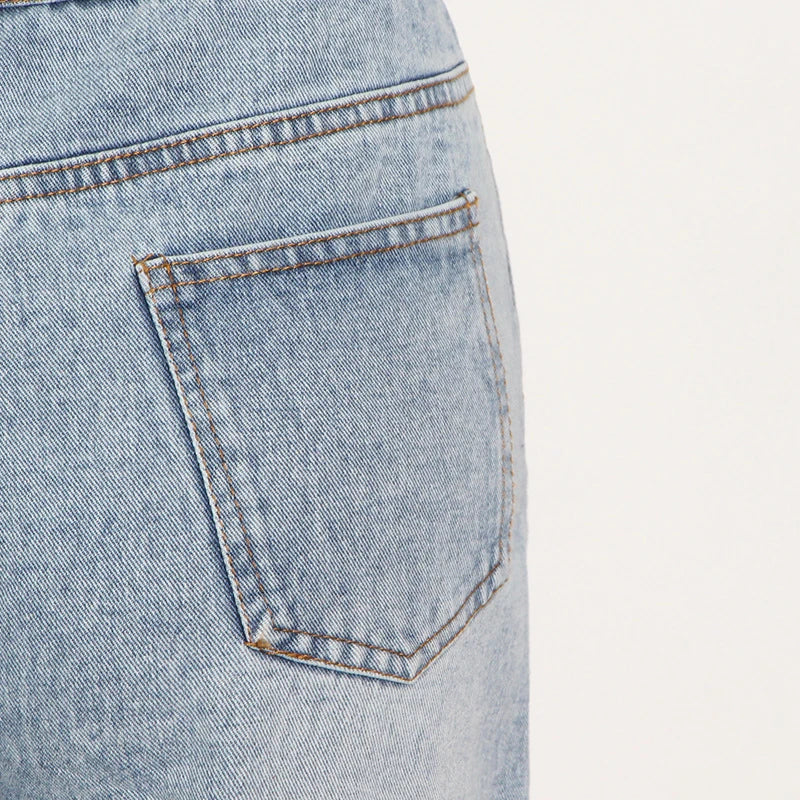 High-waisted wide-leg denim trousers in a stylish blue colour, featuring a comfortable and flattering fit