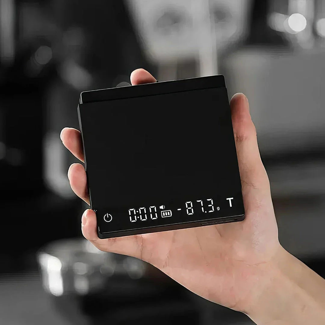 Precision Digital Coffee Scale with sleek white design and accurate 0.1g measurements for perfect coffee brewing