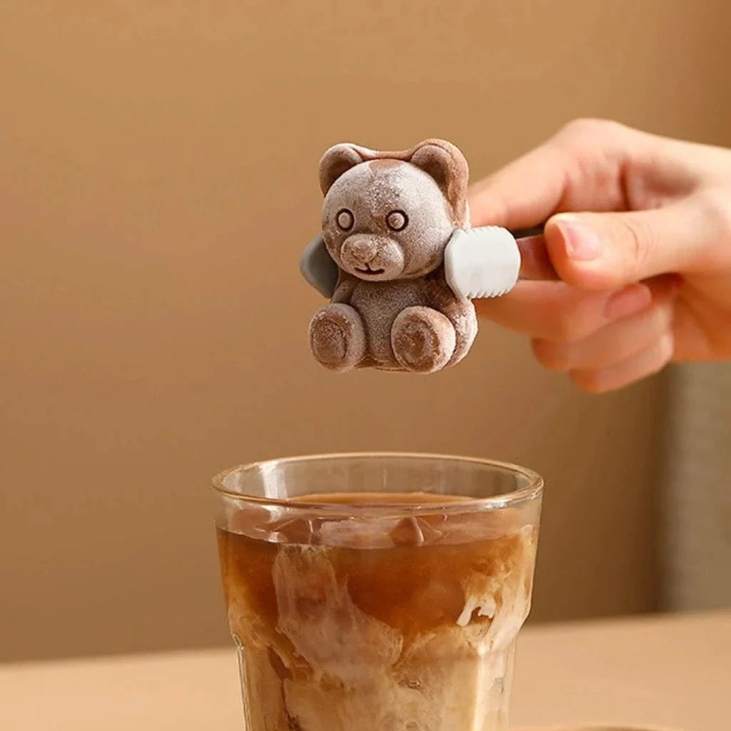 Yellow silicone bear-shaped ice cube mould for creating fun and creative frozen treats